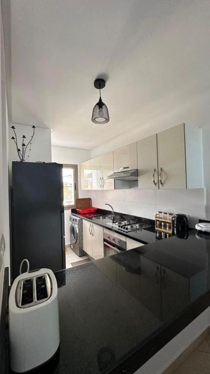 Appartement Pied Dans L Eau A Residence Beralmar Asilah Exterior foto